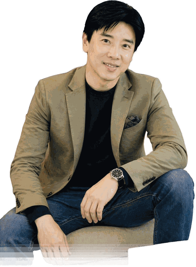Dato' Seri Ivan Teh seated in a khaki blazer